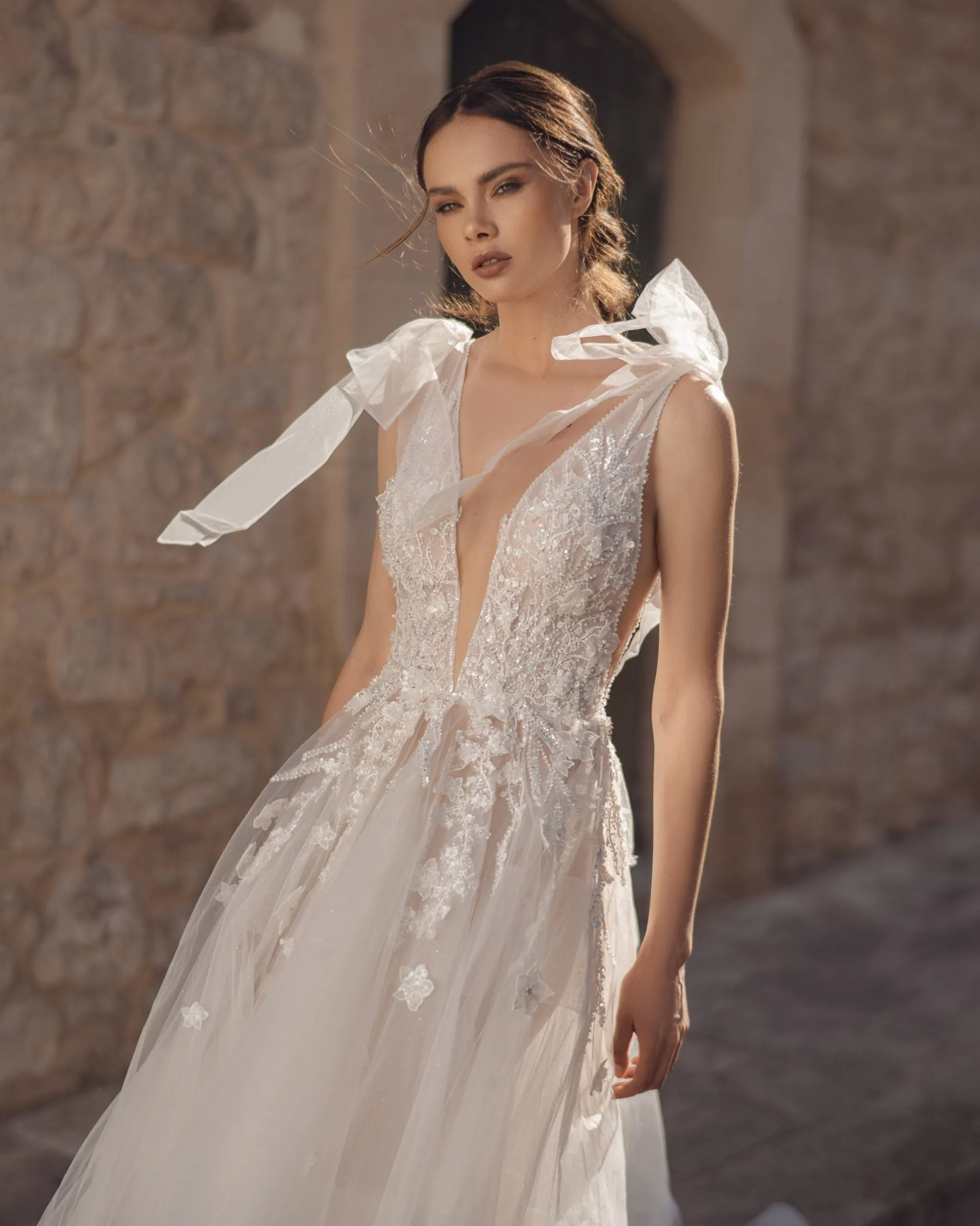 Breathtaking A-Line Wedding Gown with Exquisite Lace, Romantic Cap Sleeves, and a Flattering V-Neckline for an Effortlessly Elegant Bridal Look - Image 3