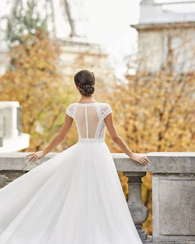 Charming A-Line Wedding Gown with Cap Sleeves, Elegant V-Neckline, and Delicate Lace Detailing for a Graceful Bridal Look - Image 3