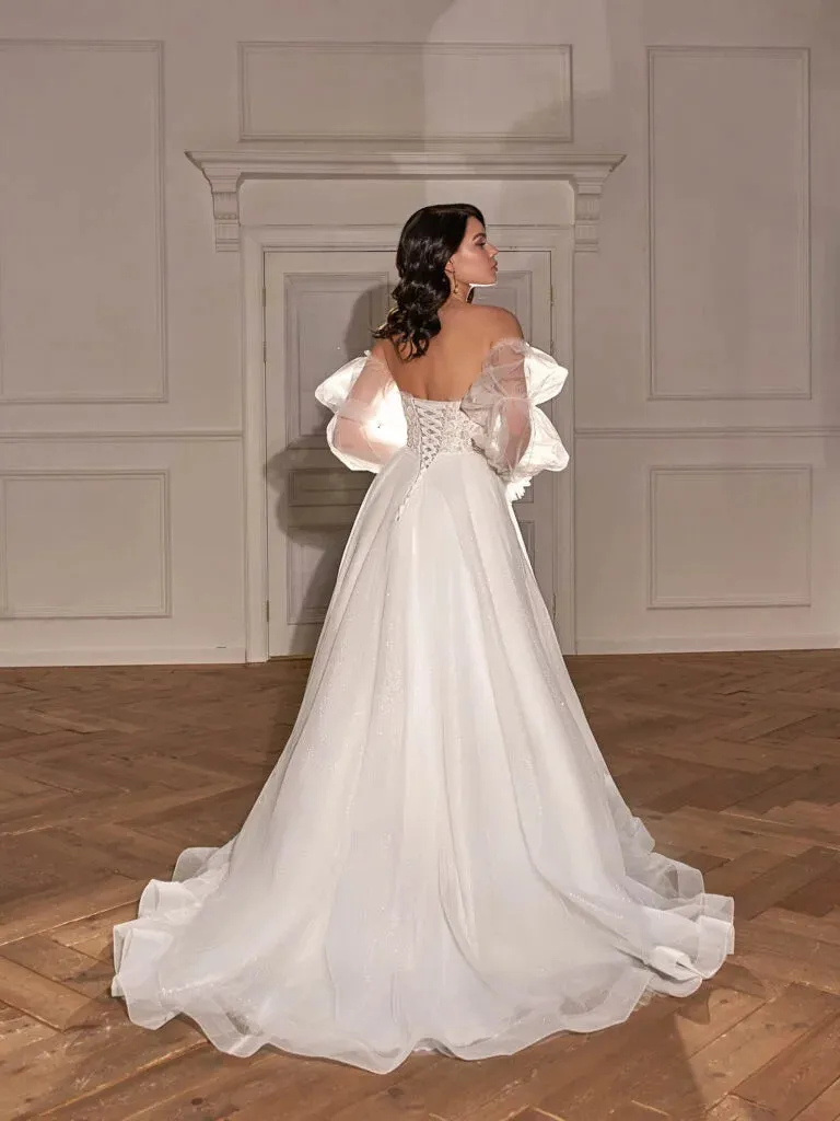 Classic A-Line Bridal Gown with Long Sleeves, Nude Neckline, Lace Embellishments, and Natural Waistline - Image 2