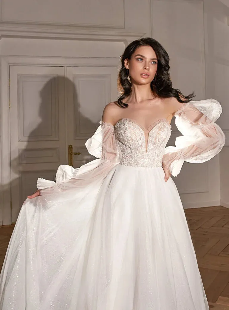 Classic A-Line Bridal Gown with Long Sleeves, Nude Neckline, Lace Embellishments, and Natural Waistline - Image 3