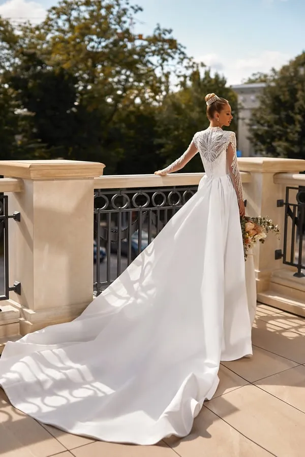 Elegant A-Line Bridal Gown with Long Sleeves, Button Embellishments, and a Natural Waistline for a Timeless Bridal Look - Image 2