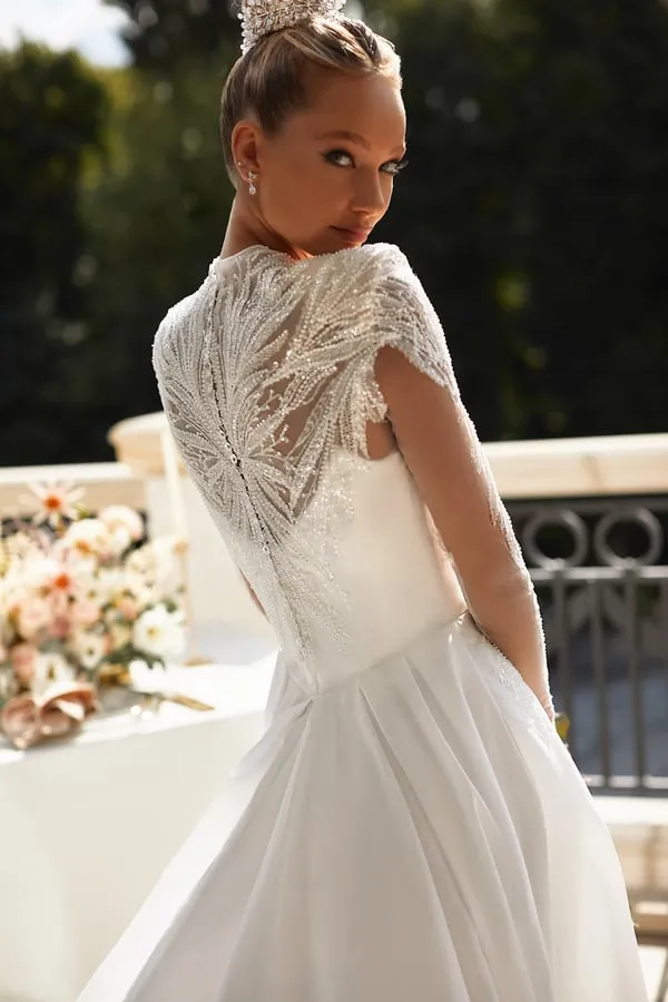 Elegant A-Line Bridal Gown with Long Sleeves, Button Embellishments, and a Natural Waistline for a Timeless Bridal Look - Image 3