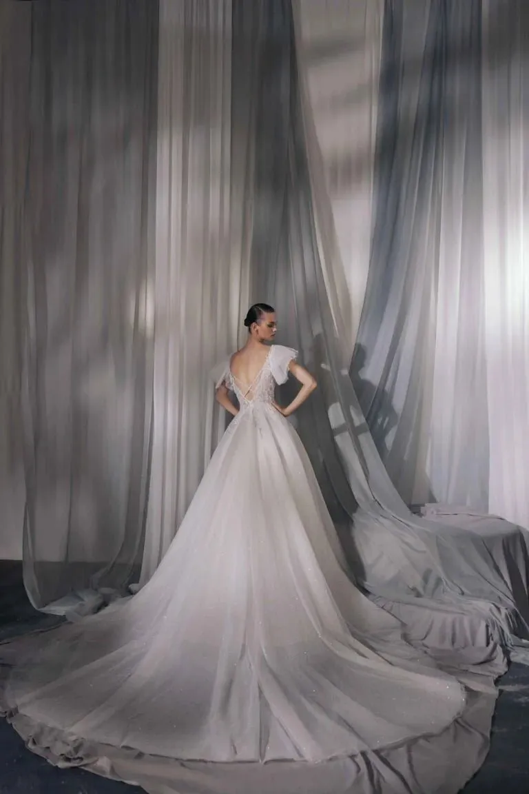 Elegant A-Line Puffy Bridal Gown with Illusion Sleeves, V-Neckline, Lace Embellishments, and Natural Waistline for a Stunning Look - Image 2