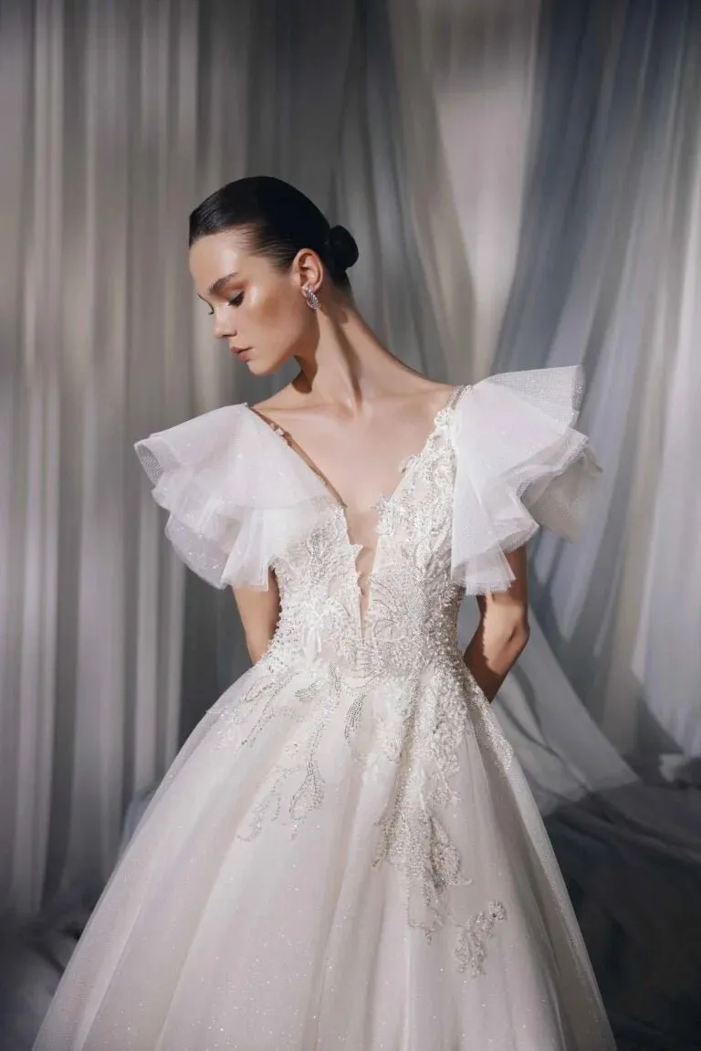 Elegant A-Line Puffy Bridal Gown with Illusion Sleeves, V-Neckline, Lace Embellishments, and Natural Waistline for a Stunning Look - Image 3
