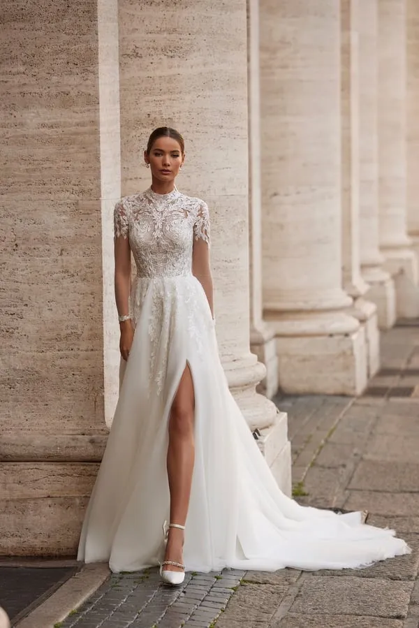 Elegant A-Line Wedding Dress with Illusion Sleeves, High Neckline, and Exquisite Embellishments - Image 3