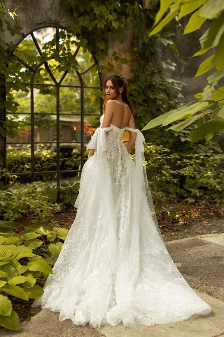 Elegant A-Line Wedding Gown with Off-Shoulder Neckline, Delicate Beaded Lace Details, and a Flattering Dropped Waist for a Breathtaking Bridal Look - Image 2