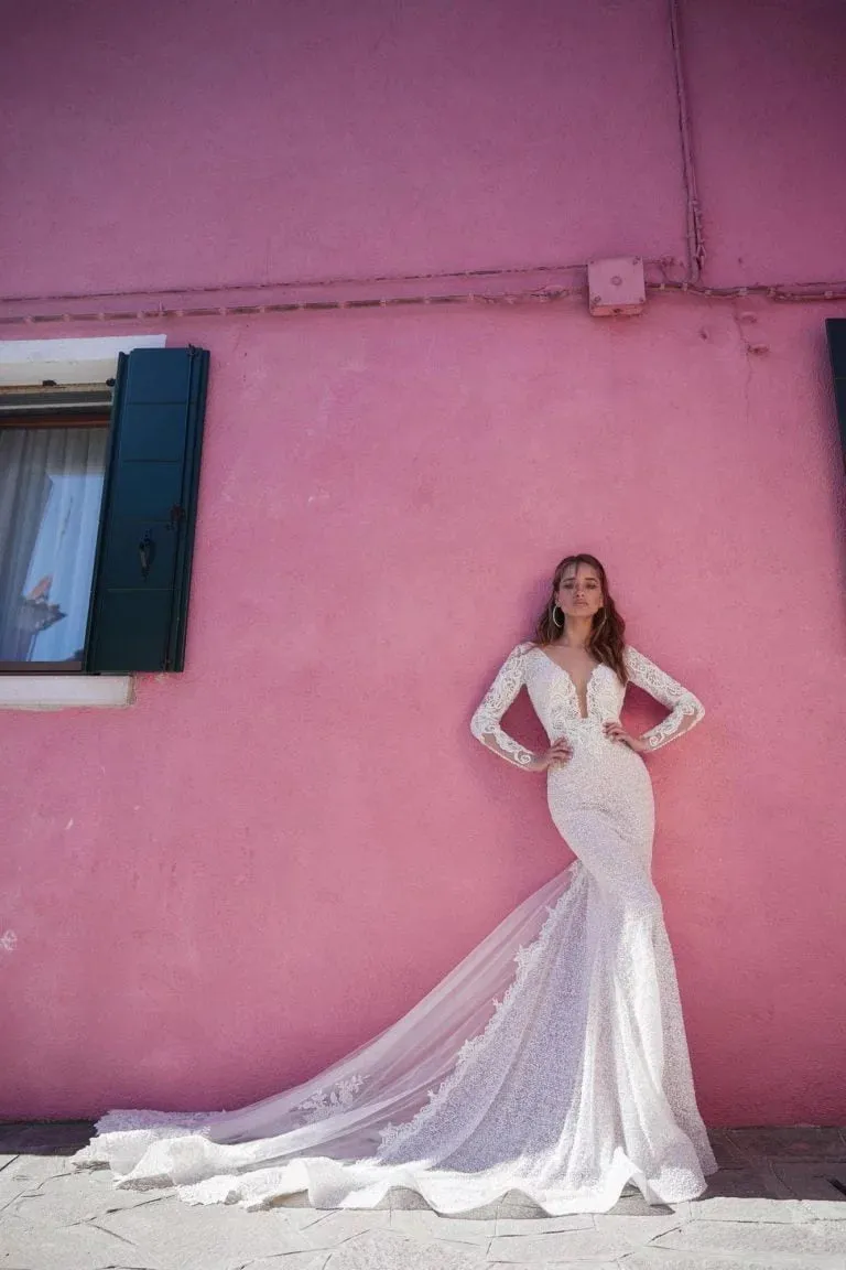 Elegant Mermaid Wedding Gown with Long Sleeves, Graceful V-Neckline, and Sparkling Beaded Lace Detailing for a Sophisticated and Timeless Bridal Look