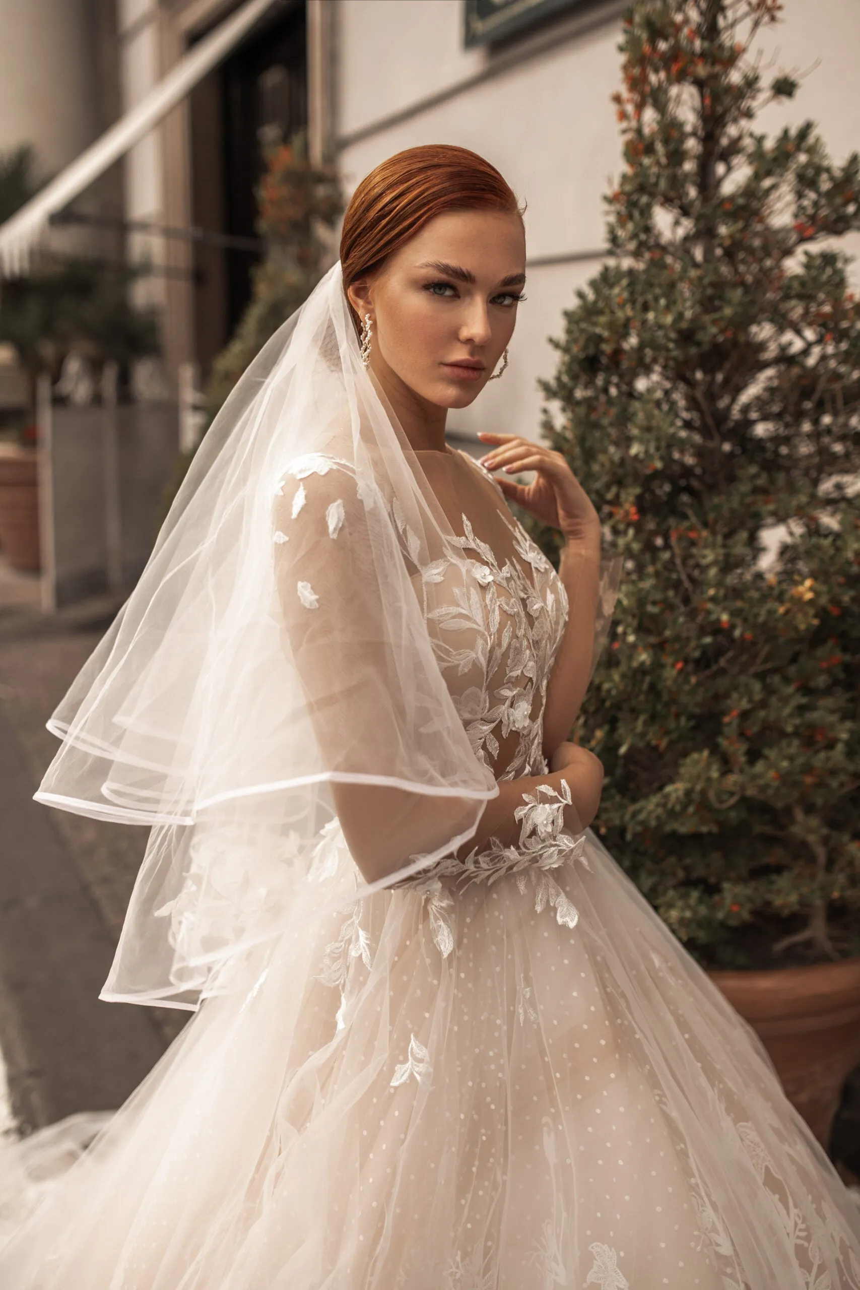 Ethereal A-Line Wedding Gown with Illusion Sleeves, Button Detailing, and a Romantic Puffy Silhouette - Image 5