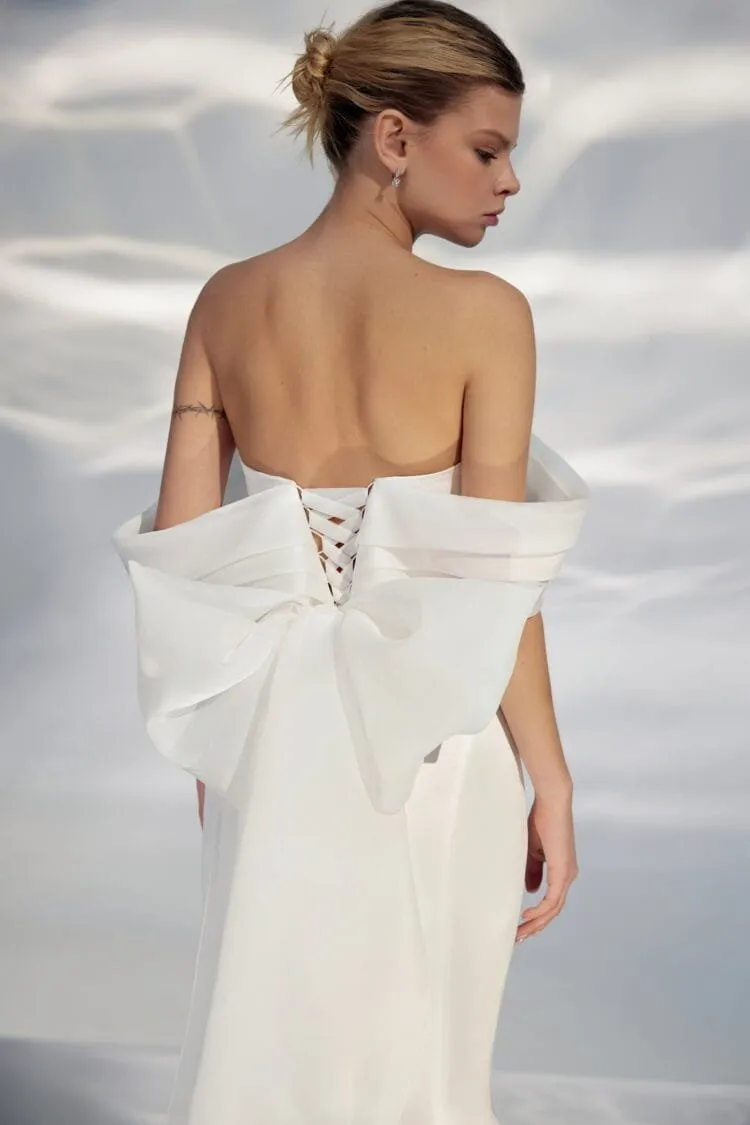 Ethereal Off-Shoulder A-Line Wedding Gown with Sweetheart Neckline, Bant Embellishment, and a Natural Waistline for a Breathtaking Bridal Look - Image 3