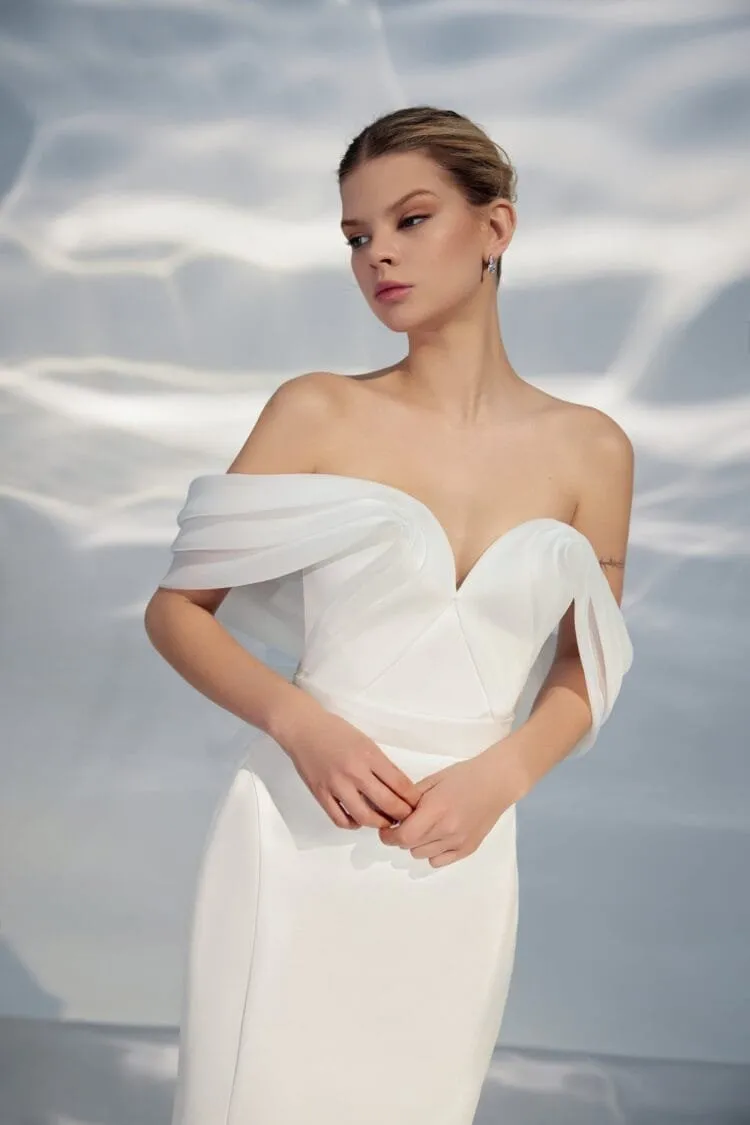 Ethereal Off-Shoulder A-Line Wedding Gown with Sweetheart Neckline, Bant Embellishment, and a Natural Waistline for a Breathtaking Bridal Look - Image 4