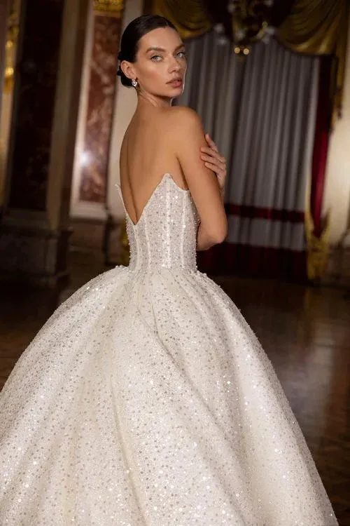 Exquisite Ball Gown Wedding Dress with Sleeveless Design, Deep Cut Neckline, and Sequined Embellishments - Image 2