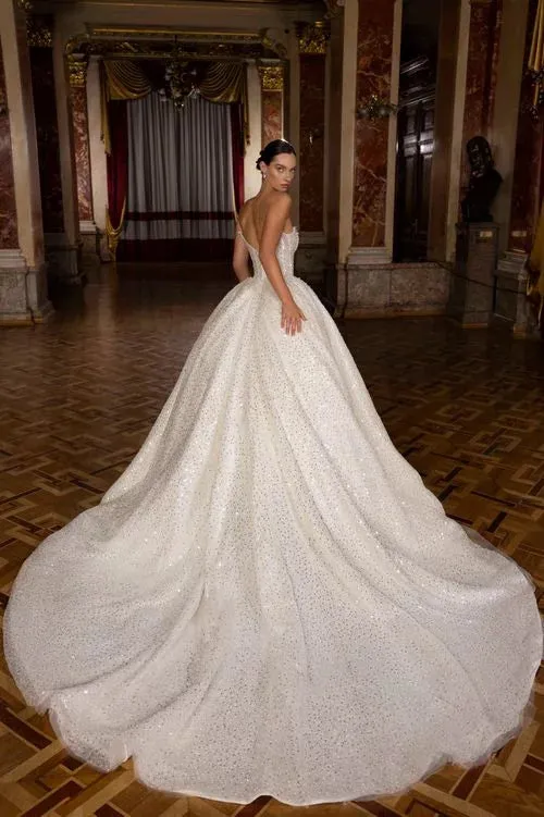 Exquisite Ball Gown Wedding Dress with Sleeveless Design, Deep Cut Neckline, and Sequined Embellishments - Image 3
