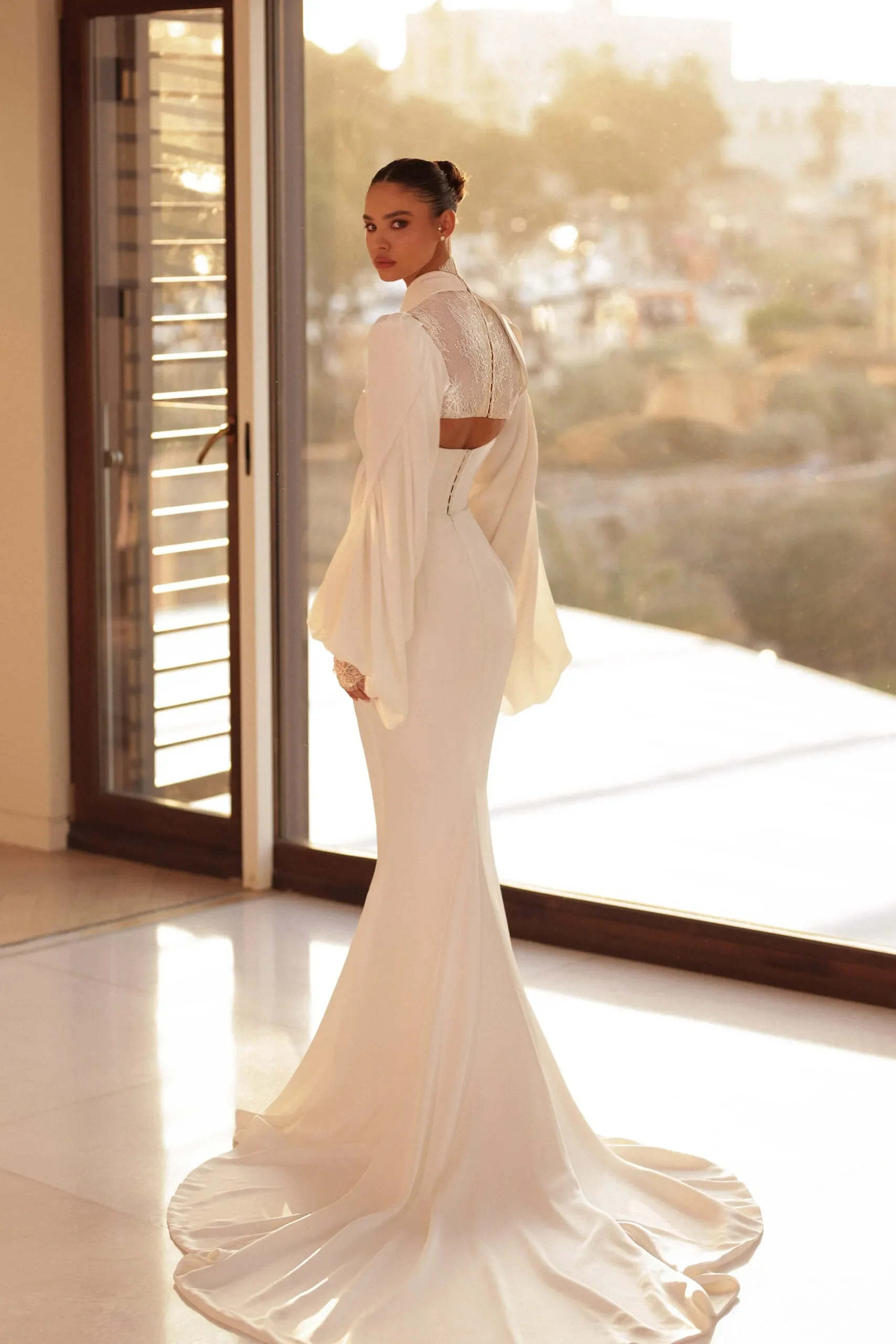 Glamorous Mermaid Wedding Gown with Long Sleeves, Halter Neckline, and Sequin Lace Embellishments for a Stunning Bridal Look - Image 3