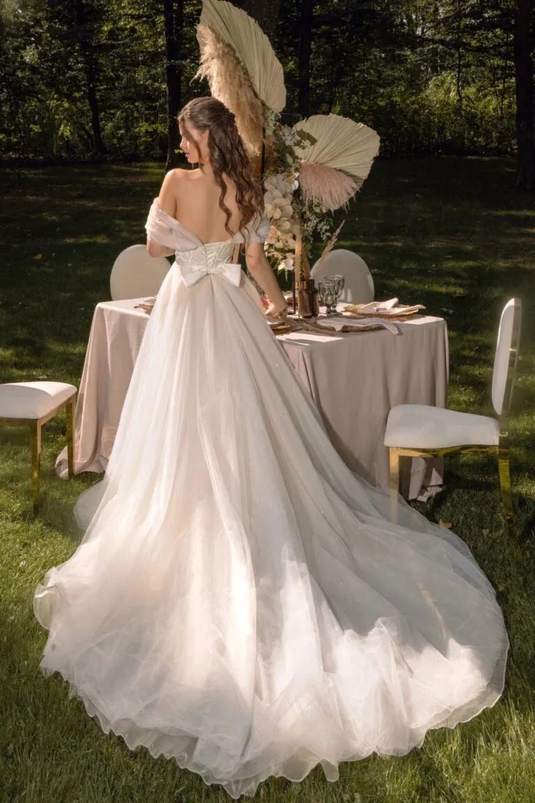 Glamorous Strapless A-Line Wedding Dress with Off-Shoulder Neckline and Glitter Detailing for a Dazzling Bridal Look - Image 2