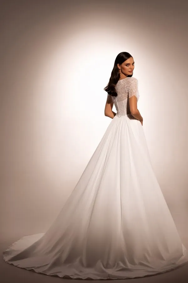 Graceful A-Line Wedding Gown with Boat Neckline and Corset Detail - Image 2