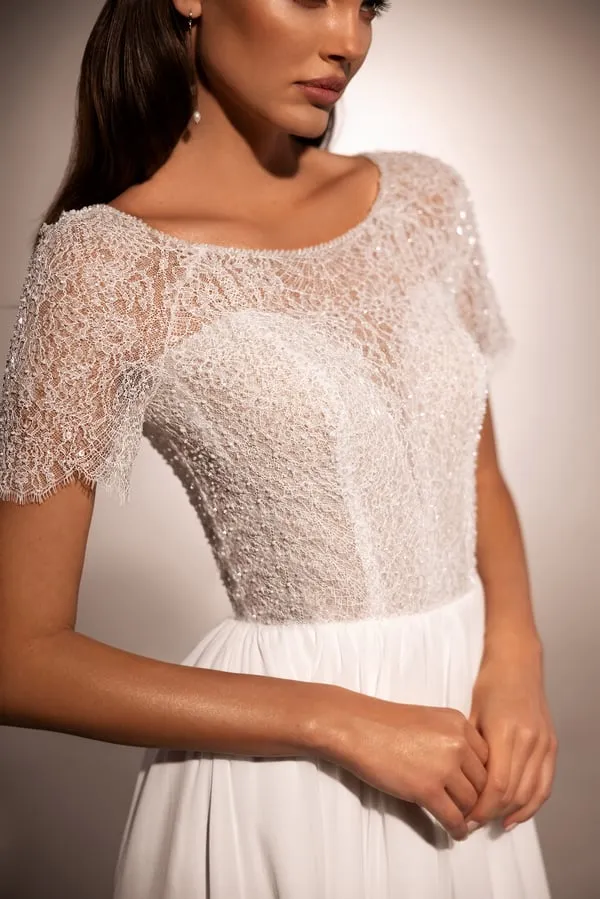 Graceful A-Line Wedding Gown with Boat Neckline and Corset Detail - Image 3