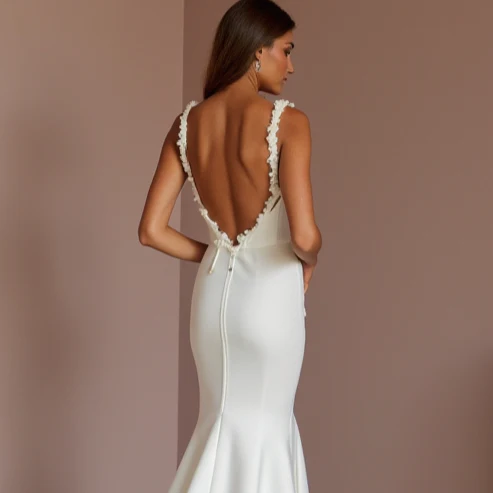 White Mermaid Wedding Dress with an Illusion Back for a Subtle Sexy Touch - Image 5