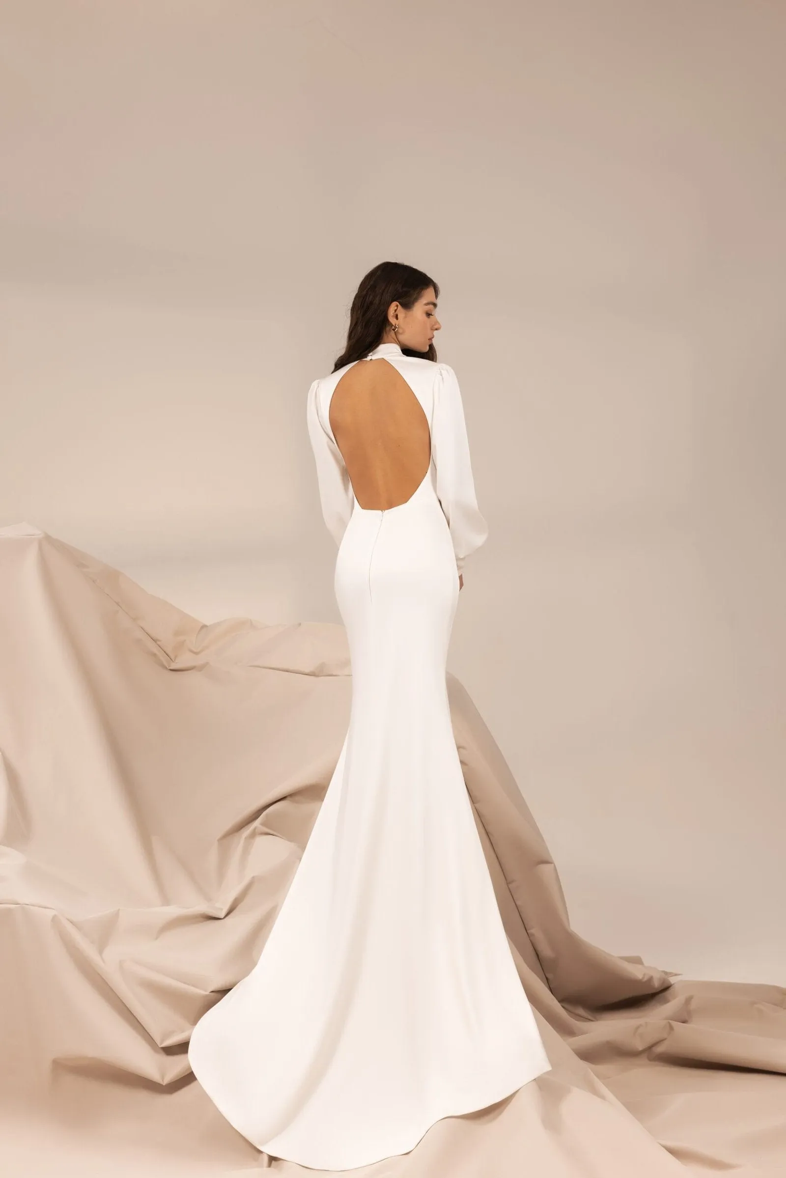 Modern Minimalist Wedding Dress with Sleek Satin, High Neckline & Elegant Open Back with Delicate Button Details for a Sophisticated Bridal Look - Image 2