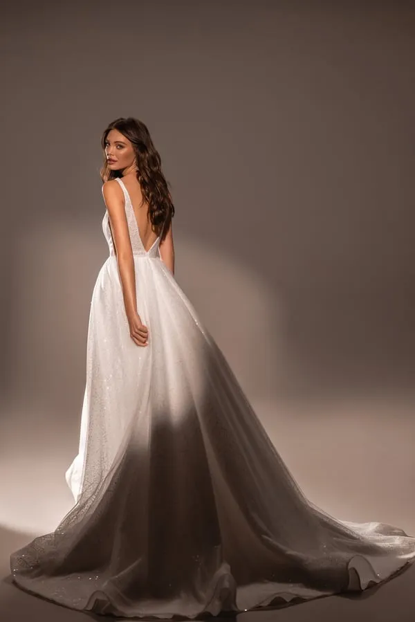 Radiant A-Line Wedding Dress with V-Neckline and Shimmering Fabric - Image 2