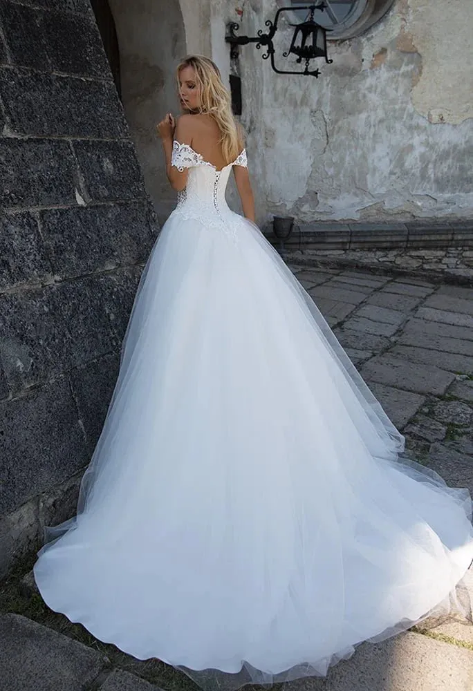 Regal Ball Gown Wedding Dress with Off-the-Shoulder Neckline, Exquisite Lace Detailing, and a Flattering Dropped Waist for a Fairytale Bridal Look - Image 3