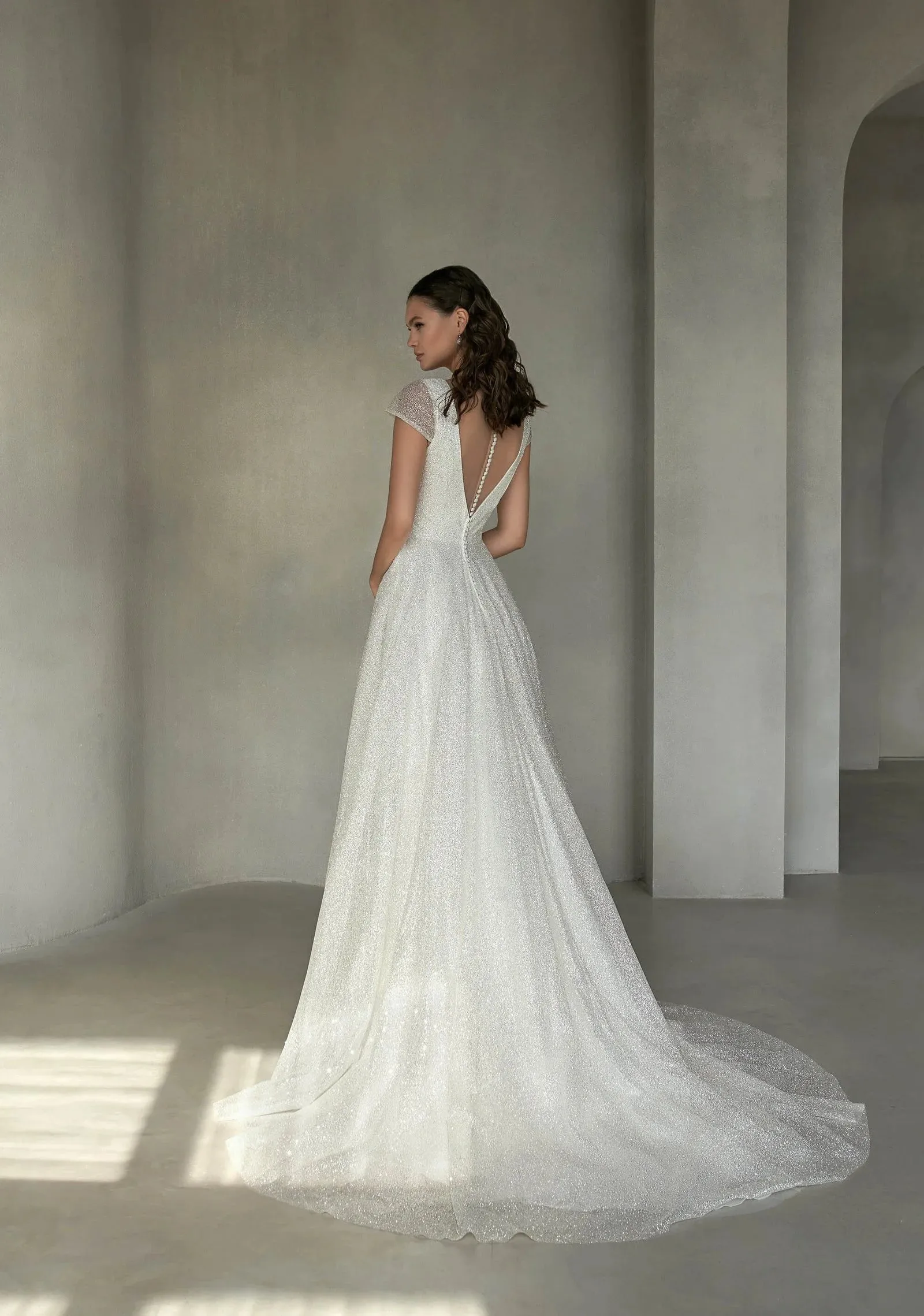 Romantic A-Line Bridal Gown with Cap Sleeves, V-Neckline, and Elegant Button Embellishments for a Stunning Look - Image 2