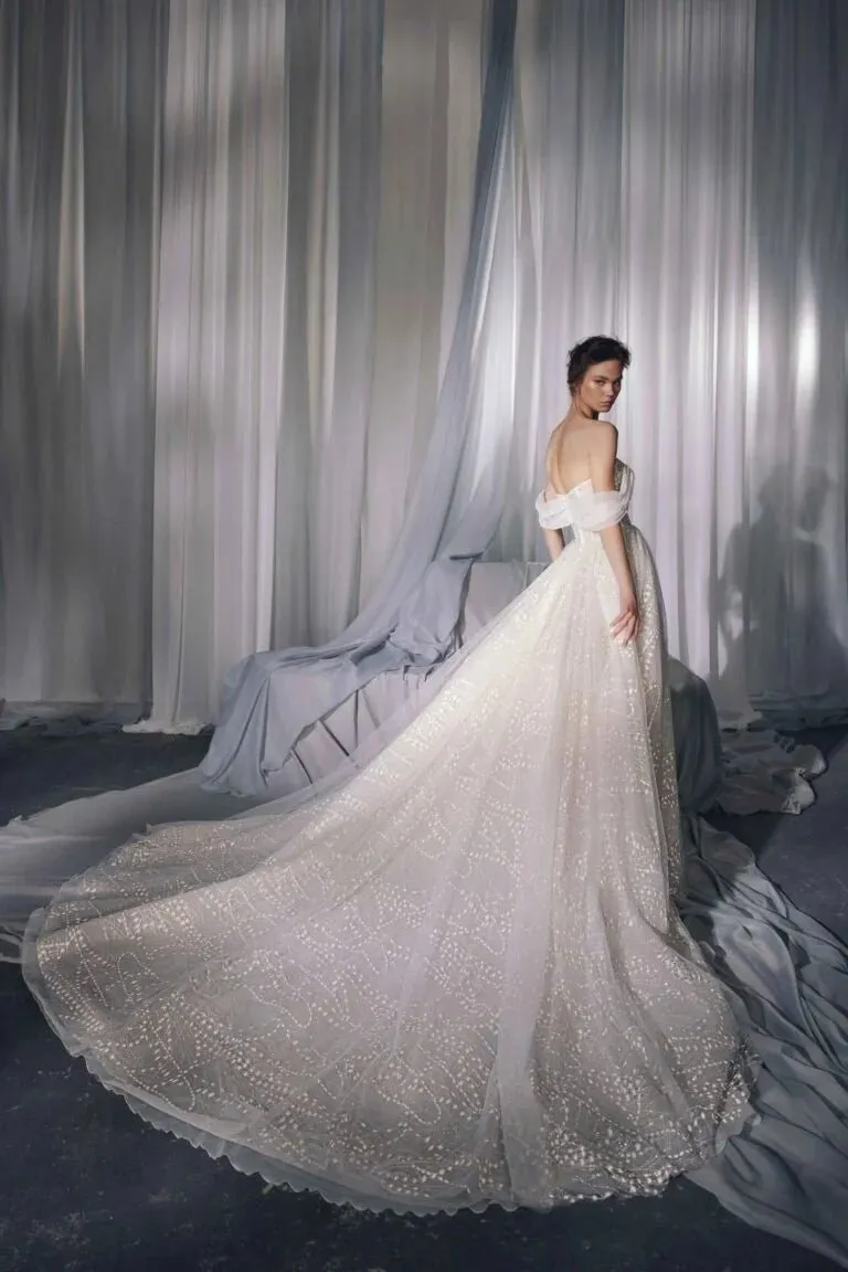 Romantic A-Line Puffy Wedding Gown with Puff Sleeves, Boat Neckline, Lace Embellishments, and Natural Waistline for a Stunning Look - Image 2