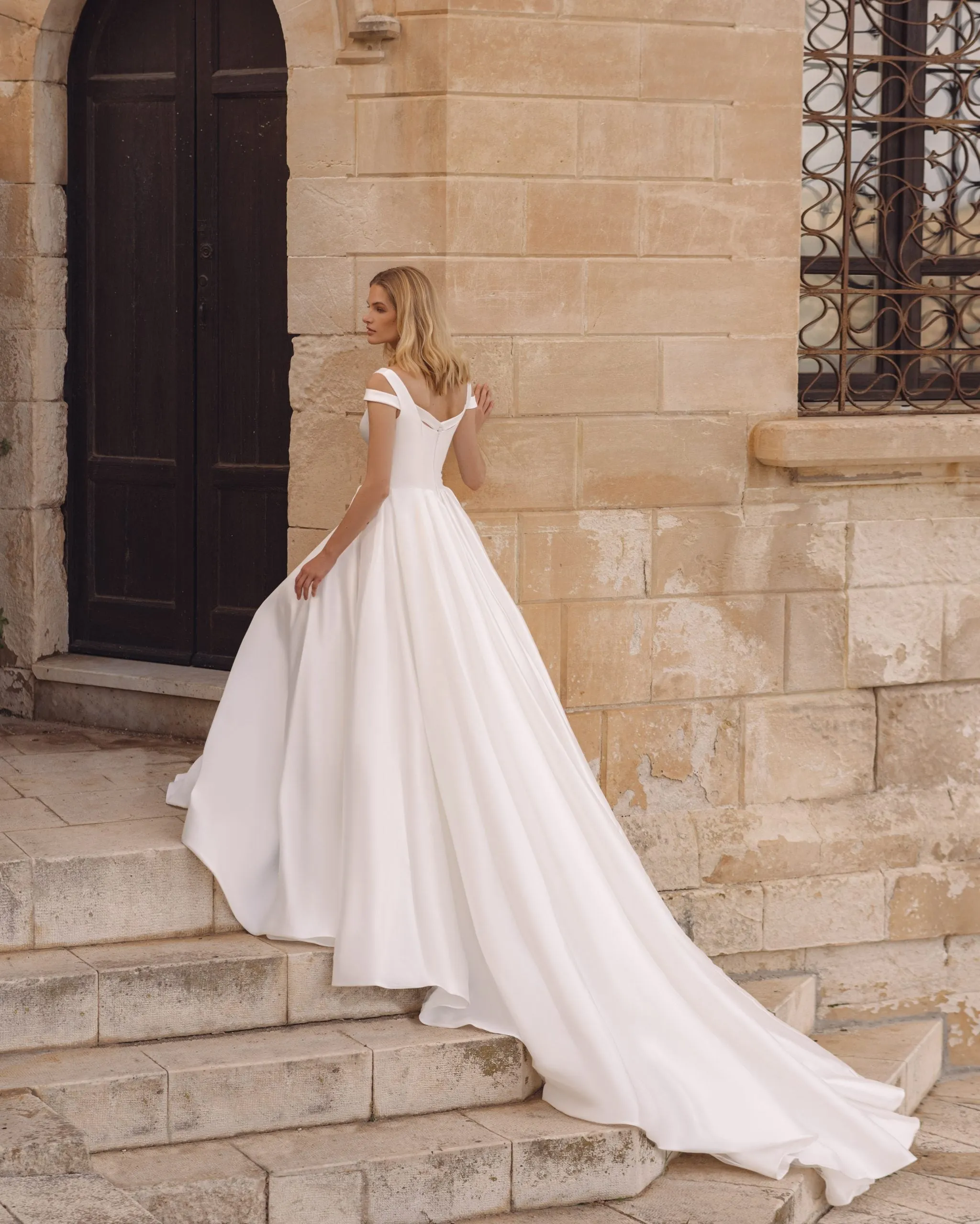 Romantic A-Line Wedding Gown, Off-Shoulder Sleeves, and a Flattering Natural Waistline for an Enchanting Bridal Look - Image 2