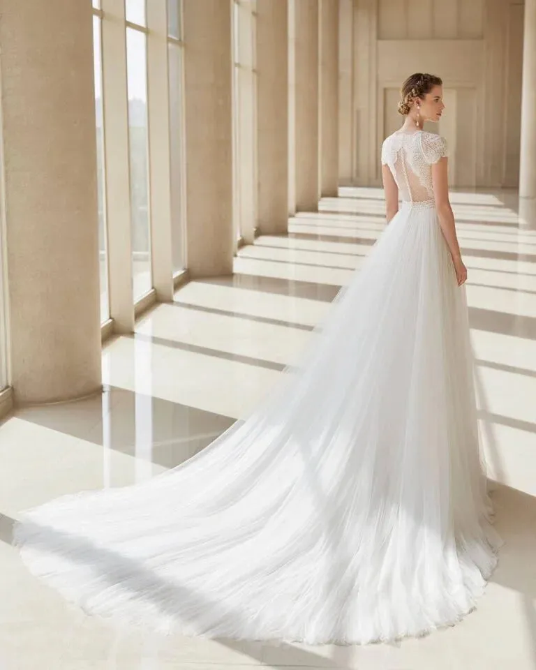 Romantic A-Line Wedding Gown with Delicate Lace Detailing, Charming Cap Sleeves, and a Flattering V-Neckline for an Elegant and Timeless Bridal Look - Image 2
