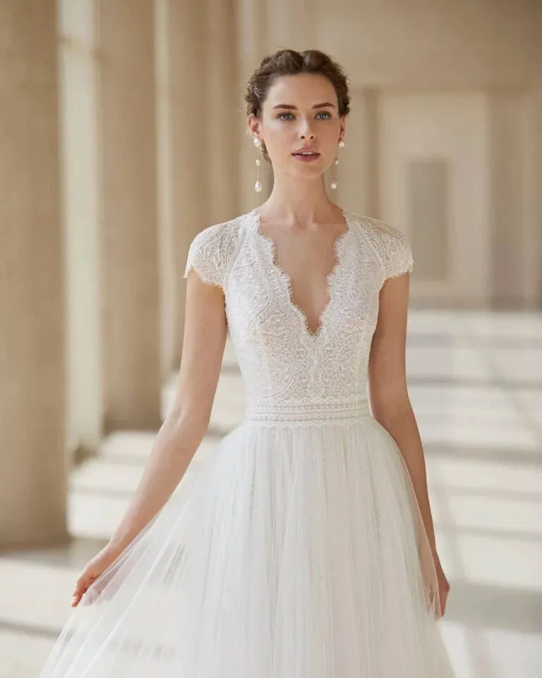 Romantic A-Line Wedding Gown with Delicate Lace Detailing, Charming Cap Sleeves, and a Flattering V-Neckline for an Elegant and Timeless Bridal Look - Image 3