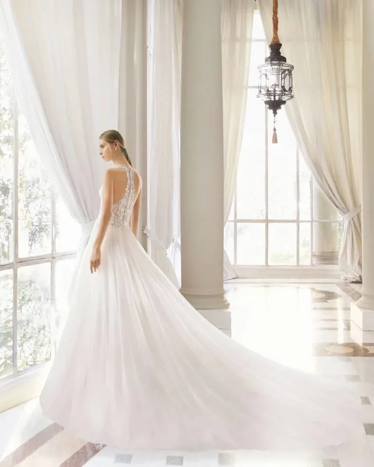Romantic A-Line Wedding Gown with Delicate Spaghetti Straps, Elegant V-Neckline, and Intricate Lace Detailing for a Breathtaking Bridal Look - Image 2