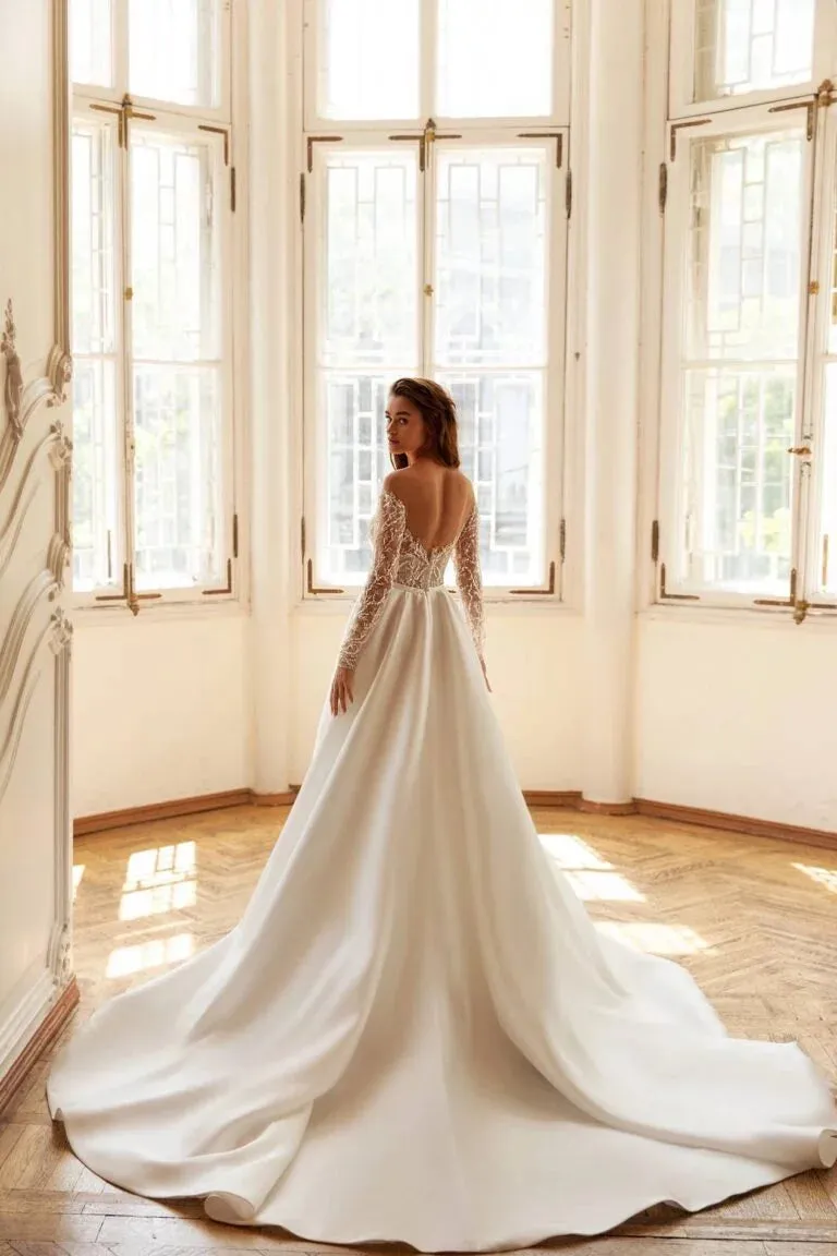Romantic A-Line Wedding Gown with Long Sleeves, Off-Shoulder Neckline, and a Flattering Dropped Waist for a Timeless Bridal Look - Image 2