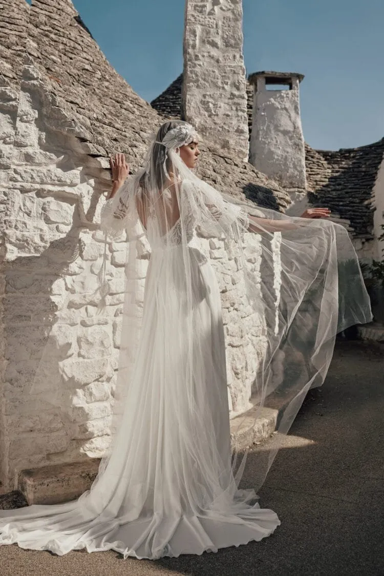 Romantic Beach Wedding Dress with Off-the-Shoulder V-Neckline, Intricate Lace Details & Flowing A-Line Silhouette for an Effortlessly Elegant Bridal Look - Image 3
