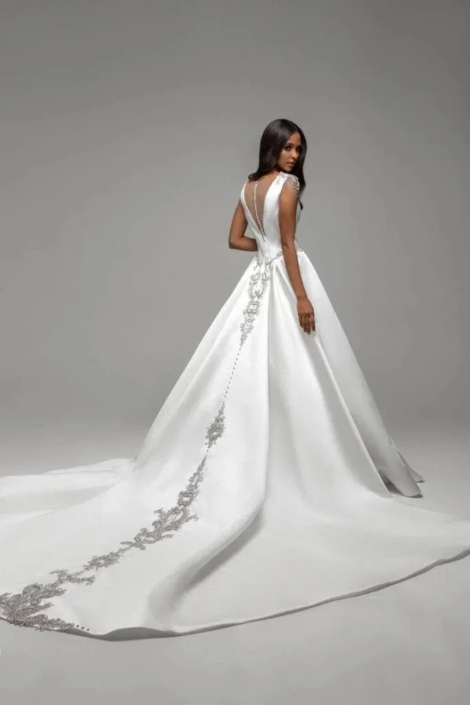 Simple A-Line Wedding Dress with Spaghetti Straps, Boat Neckline, and Lace Embellishments for a Chic Bridal Look - Image 2