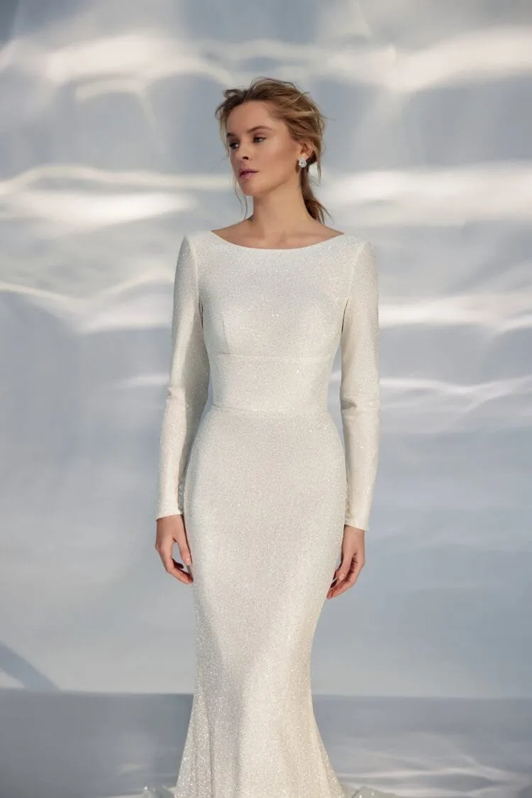 Sleek A-Line Wedding Gown with Long Sleeves, Boat Neckline, and a Natural Waistline for a Minimalist and Elegant Bridal Look - Image 4