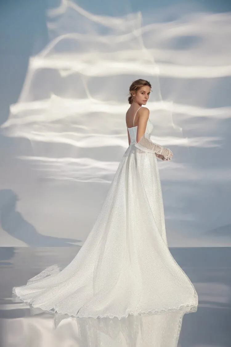 Sleek A-Line Wedding Gown with Straps, V-Neckline, Delicate Lace Embellishment, and a Natural Waistline for a Minimalist and Elegant Bridal Look - Image 3