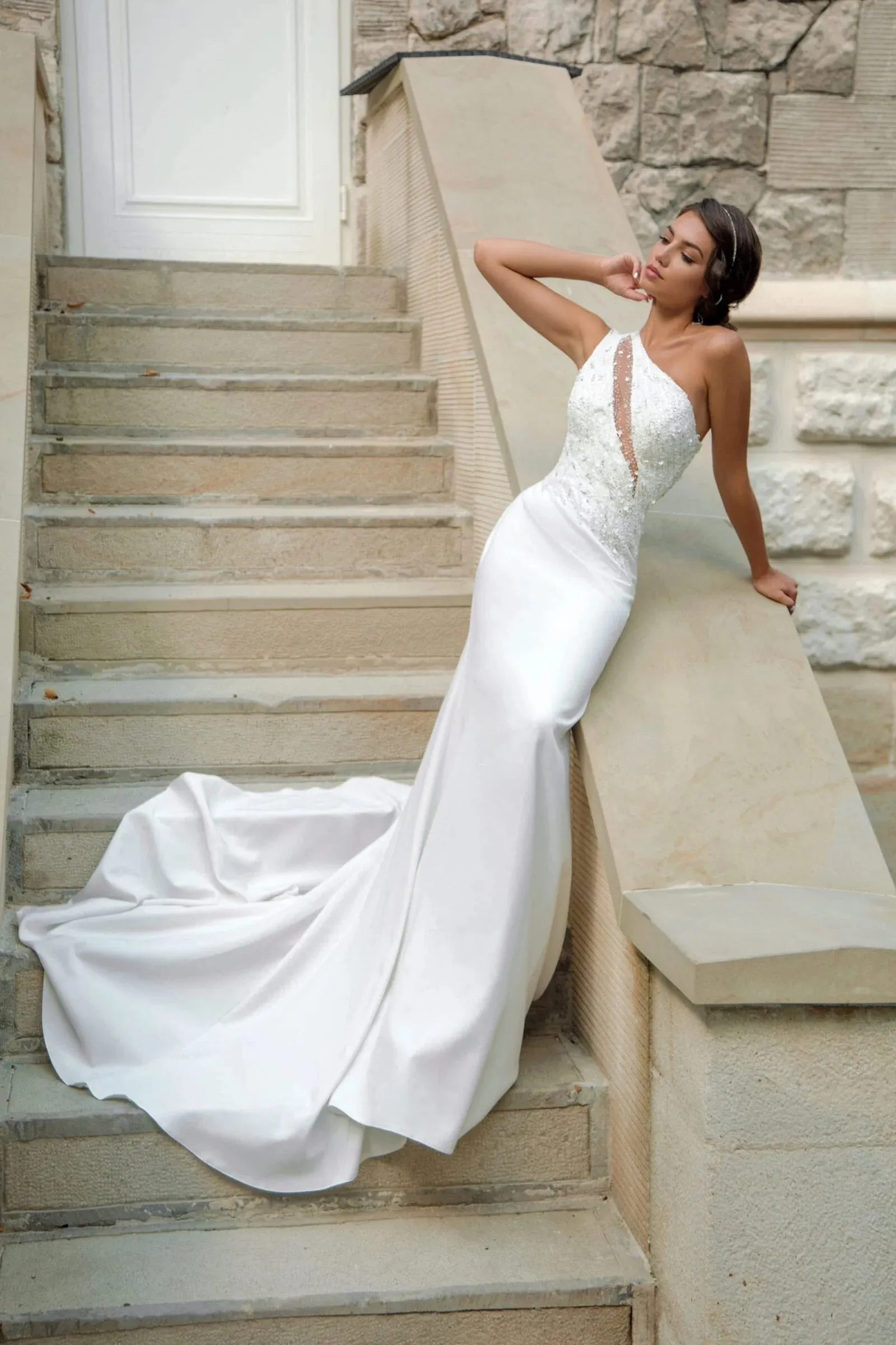Sophisticated Minimalist Mermaid Wedding Dress with Asymmetric Neckline, Delicate Straps, and Elegant Lace Embellishments - Image 4