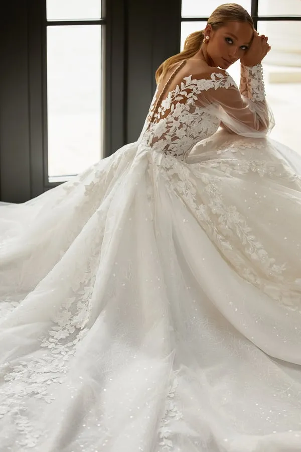 Stunning A-Line Wedding Dress with Puff Sleeves, Deep Neckline, 3D Application Embellishments, and a Natural Waistline for a Truly Elegant Bridal Look - Image 3