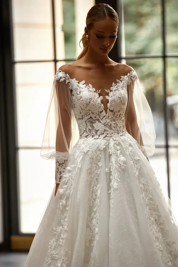 Stunning A-Line Wedding Dress with Puff Sleeves, Deep Neckline, 3D Application Embellishments, and a Natural Waistline for a Truly Elegant Bridal Look - Image 4