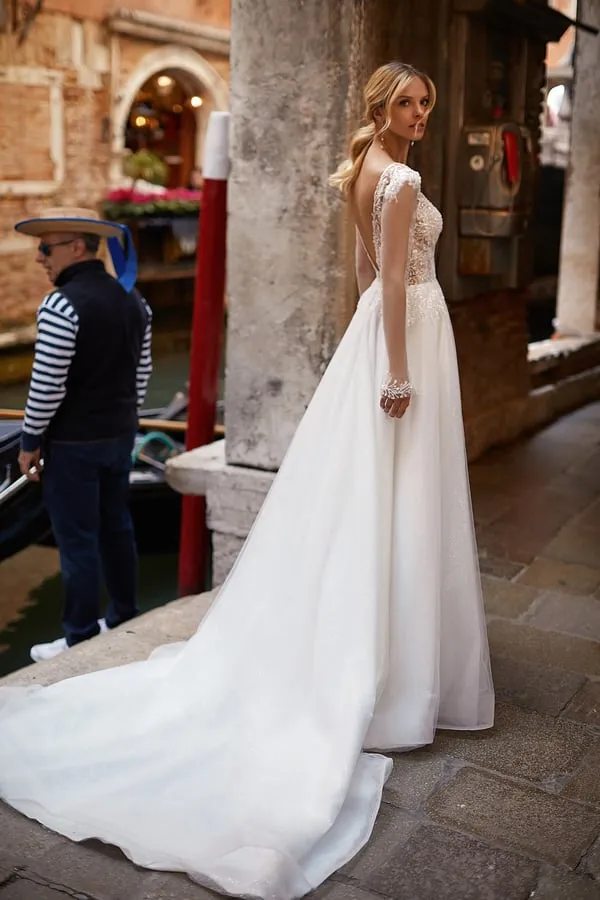 Stunning A-Line Wedding Gown with Cap Sleeves, Boat Neckline, and Elegant Embroidery, Featuring a Natural Waistline for a Timeless Bridal Look - Image 3