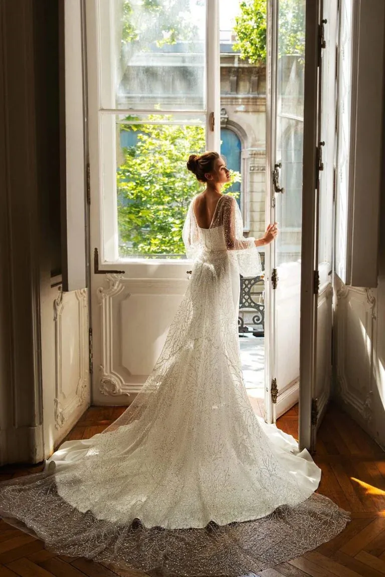 Stunning Mermaid Wedding Gown with Long Sleeves, V-Neckline, and a Flattering Natural Waist for an Elegant Bridal Look - Image 2
