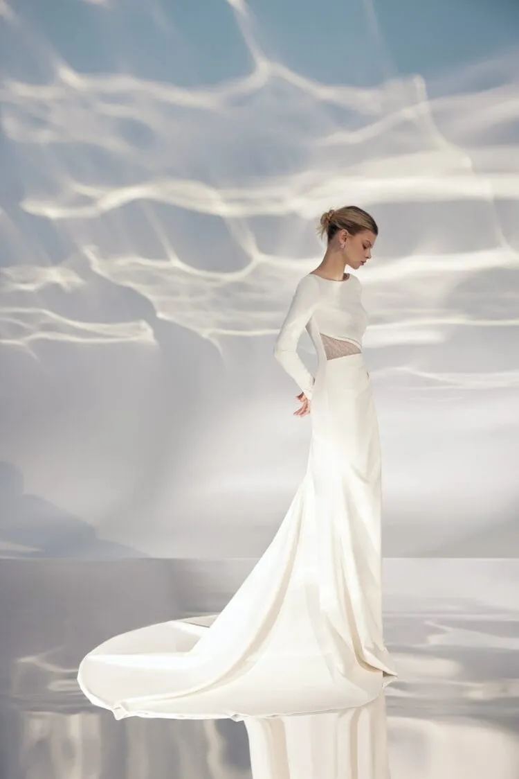 Timeless A-Line Wedding Gown with Long Sleeves, Boat Neckline, and a Natural Waistline for an Elegant and Graceful Bridal Look - Image 2