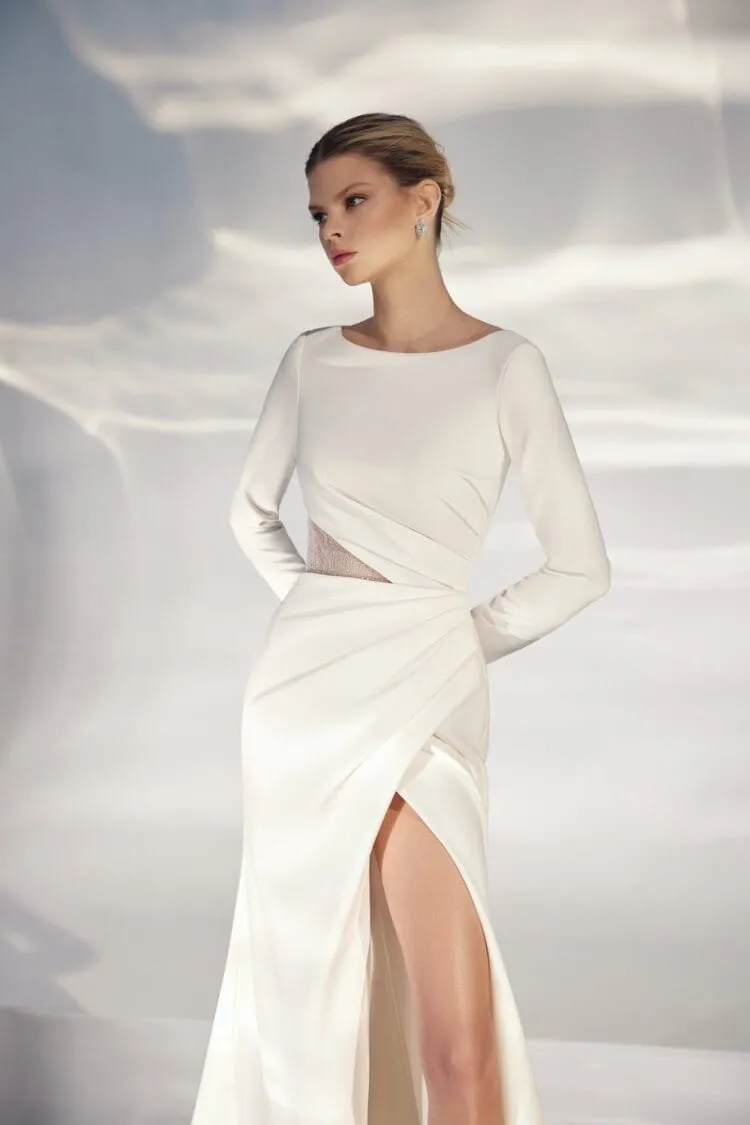 Timeless A-Line Wedding Gown with Long Sleeves, Boat Neckline, and a Natural Waistline for an Elegant and Graceful Bridal Look - Image 3