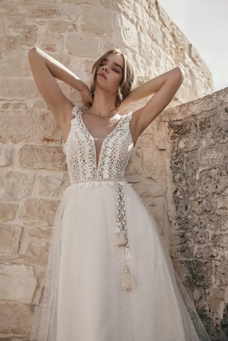 Whimsical Beach Wedding Dress with Strapless V-Neckline, Delicate Lace Details & Flowing A-Line Silhouette for a Fairy-Tale Bridal Look - Image 2