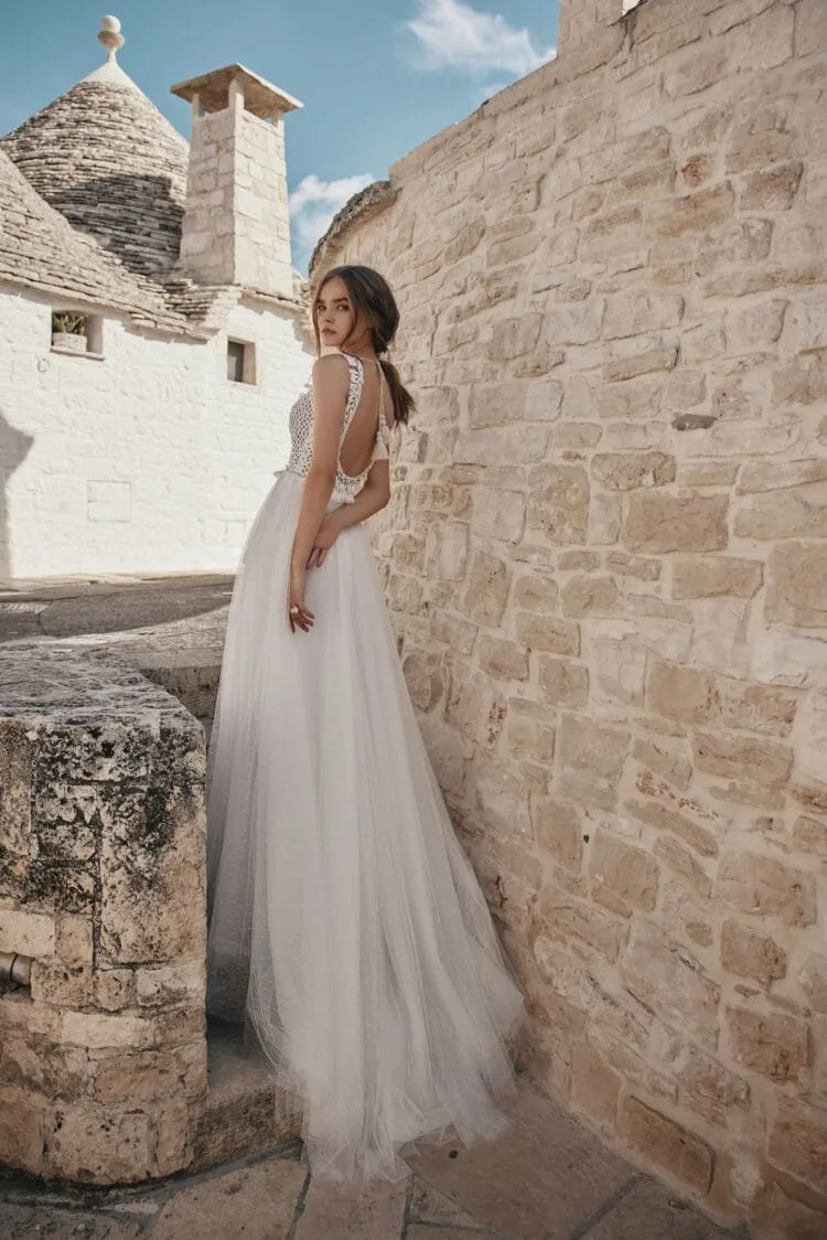Whimsical Beach Wedding Dress with Strapless V-Neckline, Delicate Lace Details & Flowing A-Line Silhouette for a Fairy-Tale Bridal Look - Image 3